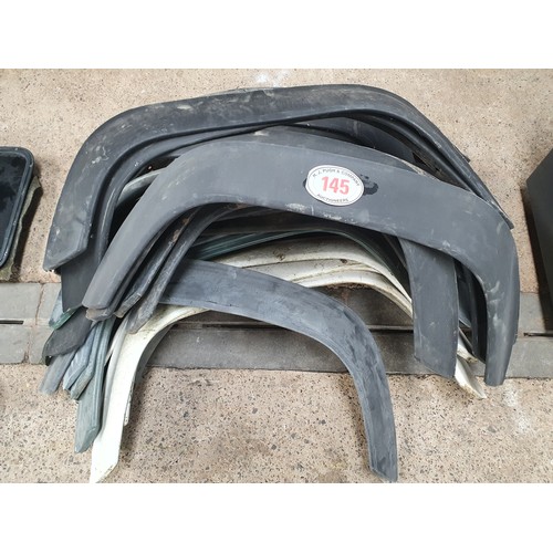 145 - Quantity of Land Rover Defender wheel arches