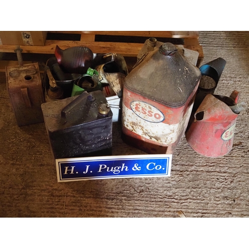 148 - Vintage oil cans and jugs