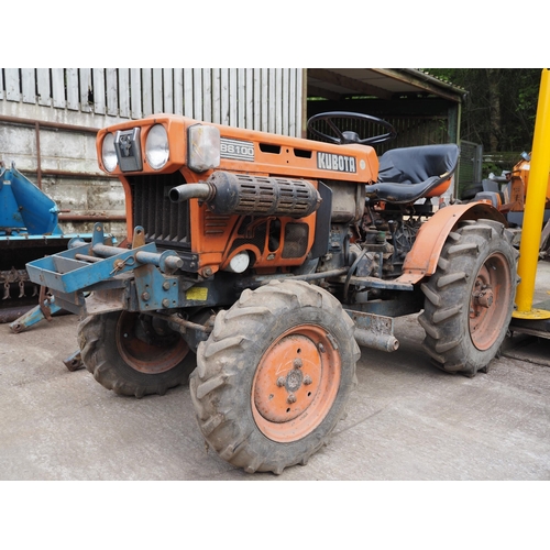 403 - Kubota B6100 4wd compact tractor and loader. Runs, 3090 hours. Reg. NCW 470X