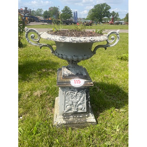 115 - Cast iron urn and stand