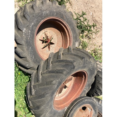 125 - Pair of JCB 3C wheels and tyres. 16.9-14-28