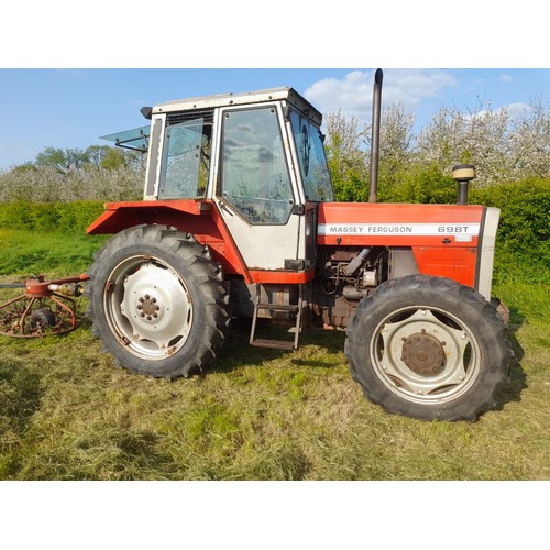 Massey Ferguson 698T tractor. 4 Wheel drive. Runs and drives well. Off farm. 5846 Hours showing.