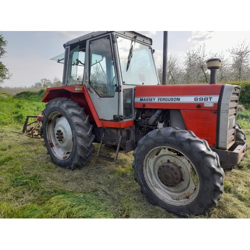 1751 - Massey Ferguson 698T tractor. 4 Wheel drive. Runs and drives well. Off farm. 5846 Hours showing.