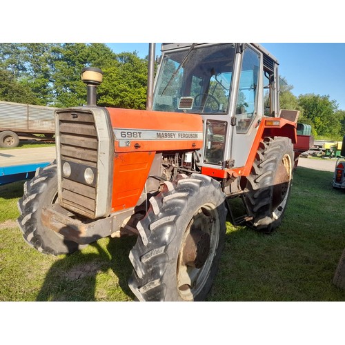 1751 - Massey Ferguson 698T tractor. 4 Wheel drive. Runs and drives well. Off farm. 5846 Hours showing.