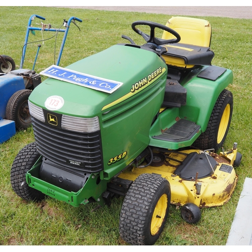 173 - John Deere 355D ride on mower with mulching insert. Manual in office. No key