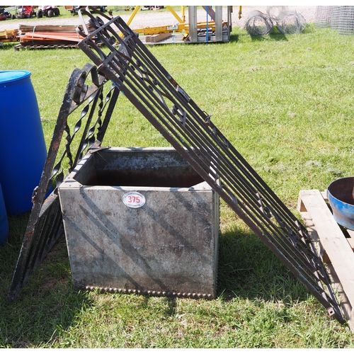 375 - Riveted galvanised water tank and 2 garden gates