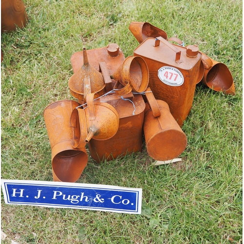 477 - Reproduction oil jugs