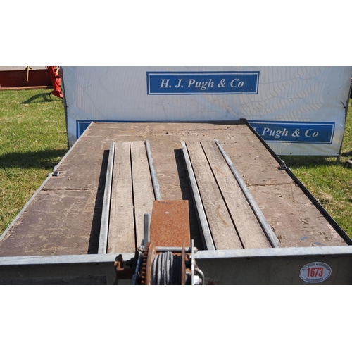 1673 - Twin axle flat bet trailer with loading ramps 10 x 6ft