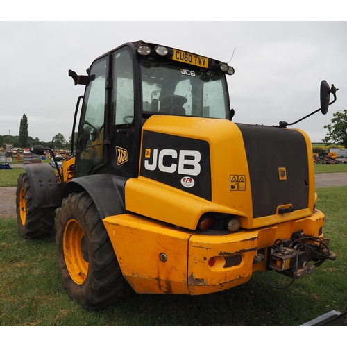 1934 - JCB TM310S with loading shovel fitted pick up hitch. Showing 7060 hours. Runs and drives. Reg. CU60 ... 