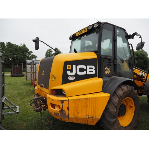 1934 - JCB TM310S with loading shovel fitted pick up hitch. Showing 7060 hours. Runs and drives. Reg. CU60 ... 