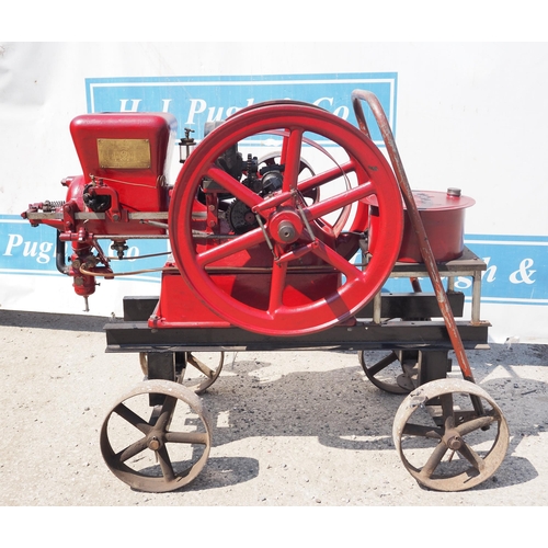 184 - Associated stationary engine on trolley. 3HP. S/No. 505475. Manufactured in Waterloo, Iowa, USA