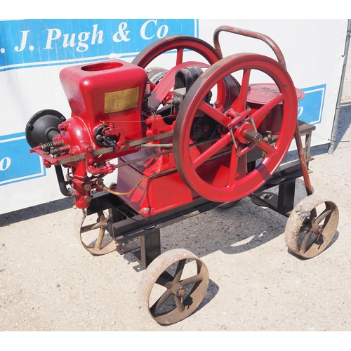 184 - Associated stationary engine on trolley. 3HP. S/No. 505475. Manufactured in Waterloo, Iowa, USA