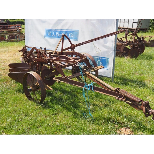 150 - McCormick Deering 3 furrow trailed plough. Manual in office