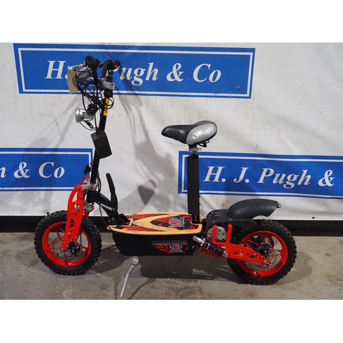 1058 - T-Walker electric off road scooter in working order with charger