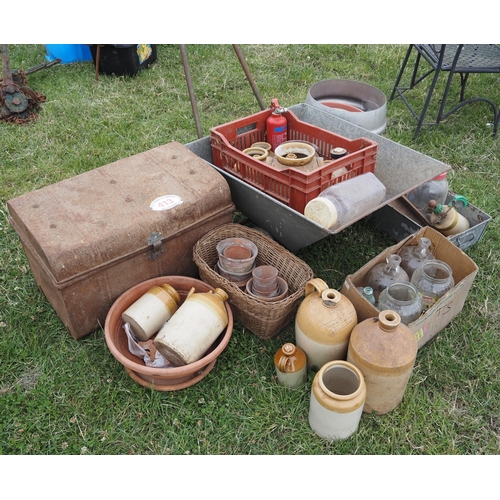 413 - Stone and glass jars, wheelbarrow, etc.