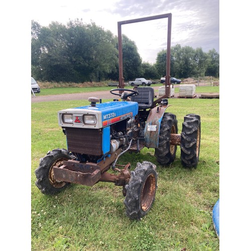 1927 - Mitsubishi MT372d compact tractor. Runs and drives. Fitted with dual wheels and roll frame.