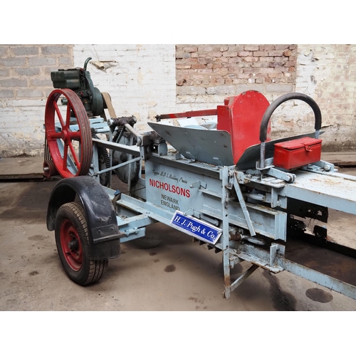 172 - Nicholson Newark baling press, in working order with Petter engine fitted on rubber wheels