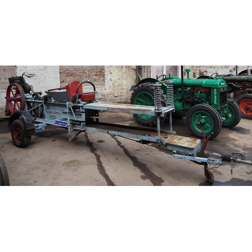 172 - Nicholson Newark baling press, in working order with Petter engine fitted on rubber wheels