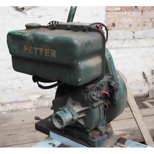 172 - Nicholson Newark baling press, in working order with Petter engine fitted on rubber wheels