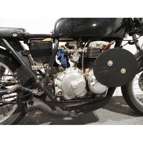 885 - Honda 400-4 Cafe Racer, 460cc
Runs and rides, engine is a 1976 400-4 with road race cams. Reg. TWP 8... 