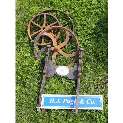 58 - Cast iron scraper and wheels