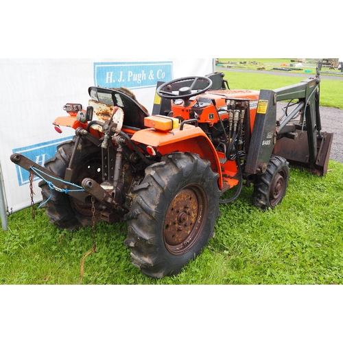 1516 - Massey 1010 tractor with loader. Runs and drives 4WD. Showing 1048 hours