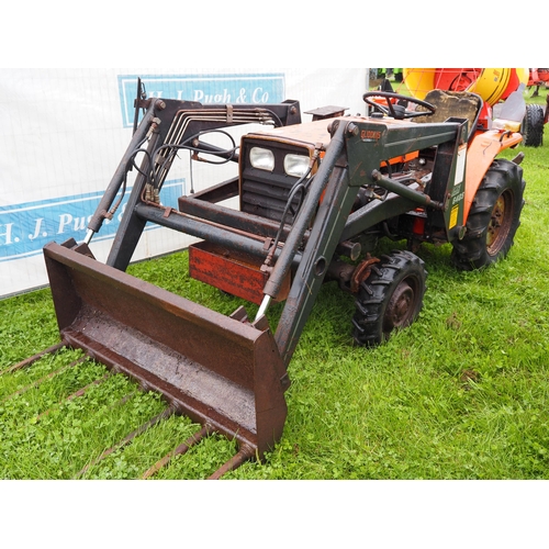 1516 - Massey 1010 tractor with loader. Runs and drives 4WD. Showing 1048 hours