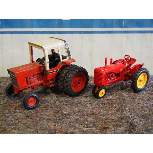 254 - Die cast models of an International 1586 and a Massey Harris 44