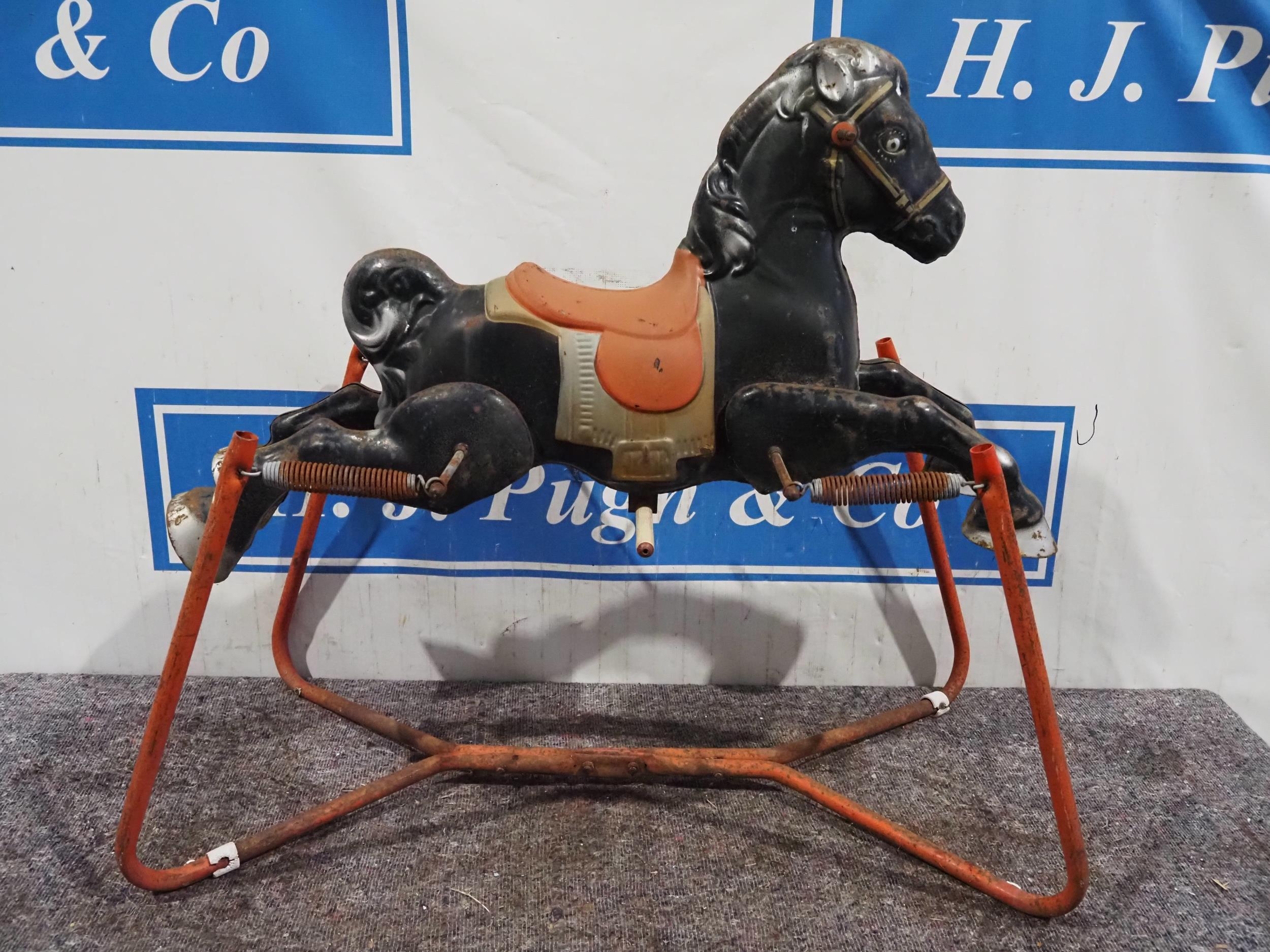 Tin rocking horse