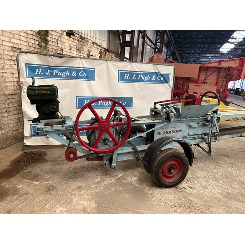 172 - Nicholson Newark baling press, in working order with Petter engine fitted on rubber wheels