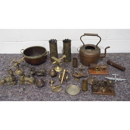 64 - Assorted brass ornaments to include kettle, book ends, scales etc.