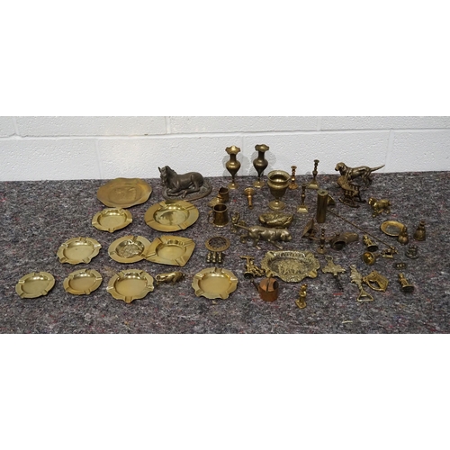 40 - Quantity of assorted brass ornaments to include animal figurines, candle stick holders, plates etc.