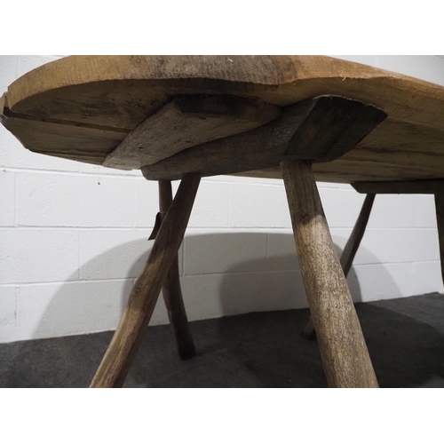 433 - Oak table on chestnut trestle legs. Comes with spare set of treadle legs with the bark still on 65