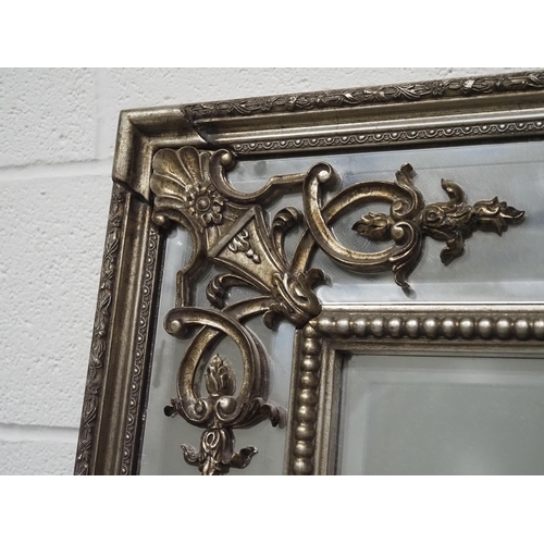 246 - Large beveled edge mirror with ornate frame 35