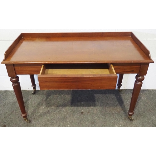 430 - Mahogany desk with drawer on brass casters 46