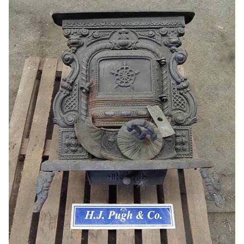 89 - Ornate cast iron stove