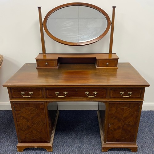 452 - Inlaid mahogany dressing table with cupboards, drawers and adjustable mirror by Gillows of Lancaster... 