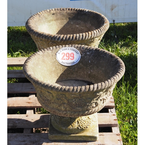 299 - Pair of stone planters on plinths 13