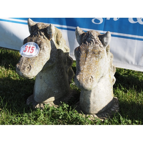 315 - Pair of stone horse heads