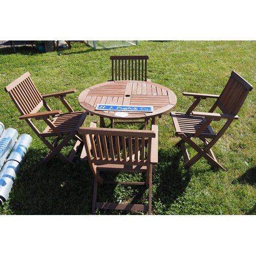 663 - Garden table and 4 chairs
