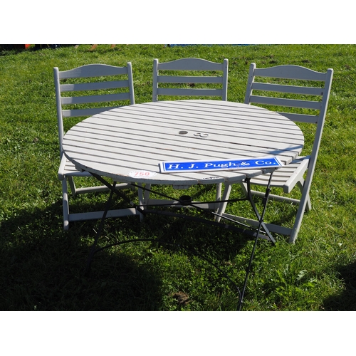 750 - Garden table and 3 chairs