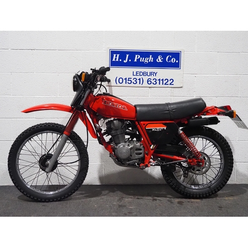 1055 - Honda XL185S enduro motorcycle. 1982. 184cc. 
Engine No. L185SE5212592
Runs and rides, comes with ow... 