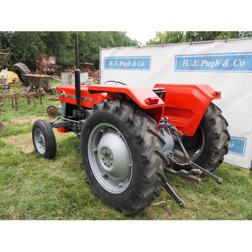 536 - Massey Ferguson 135 tractor. Older restoration, lights need rewiring, runs and drives well