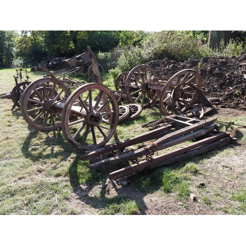 582 - Wagon parts, wheels, shafts