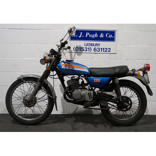 1094 - Suzuki TS125 trials bike. 1974. 123cc. 
Frame No. 86233
Engine No. 86299
Engine turns over. 
Reg. BW... 