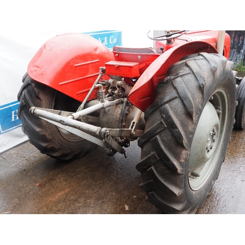 100 - Massey Ferguson 35 tractor. Runs and drives, 4-cylinder. S/N SDM141026