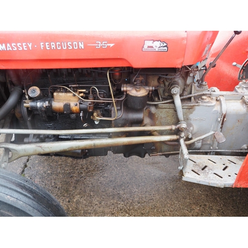 100 - Massey Ferguson 35 tractor. Runs and drives, 4-cylinder. S/N SDM141026