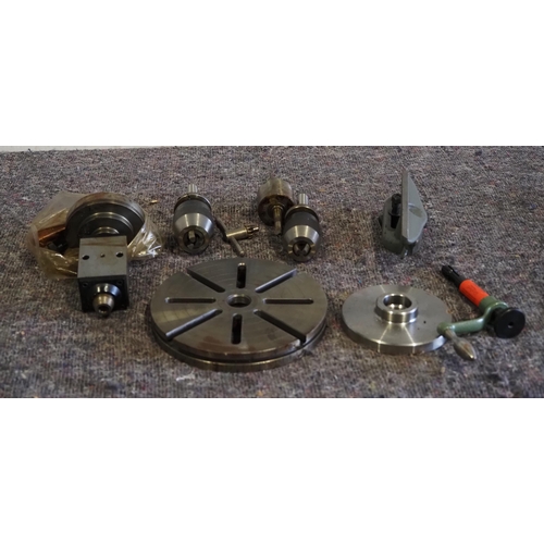 423 - Lathe chucks, face  plate, pulley and other accessories