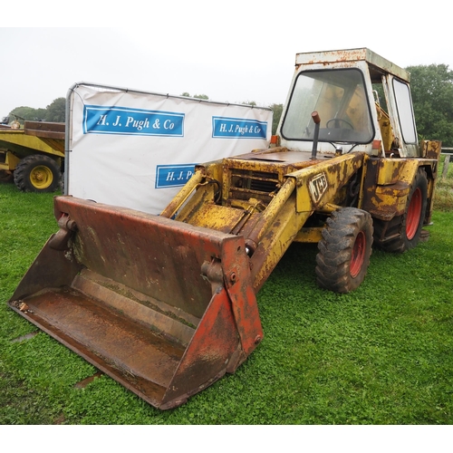 46 - JCB 3C. With 4 in one bucket, backhoe and 2ft bucket sn 3960776. Reg. DCD 674L. Runs and drives.