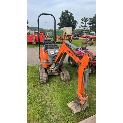 1518 - Hitachi mini digger. Expanding tracks, runs and drives, c/w spare bucket. Key in office